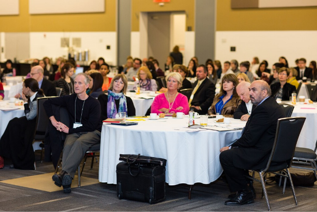Room full of CALS participants sitting at tables
